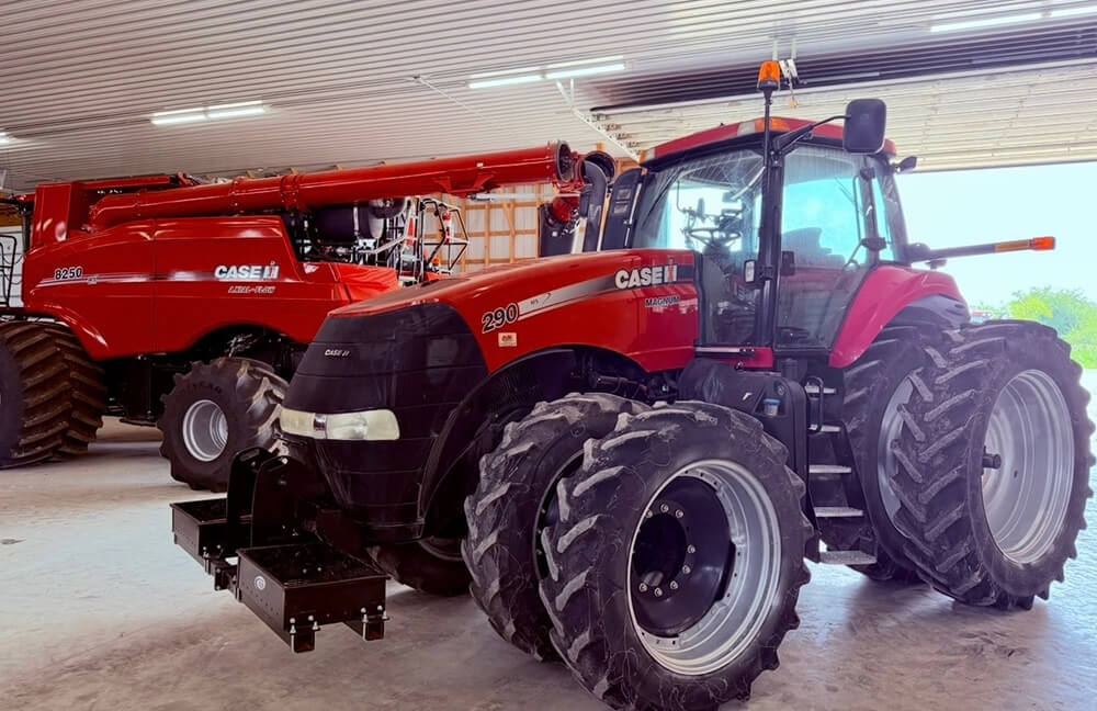 A Case IH 290 Magnum Tractor infront of a Case IH 8250 Axial Flow Combine